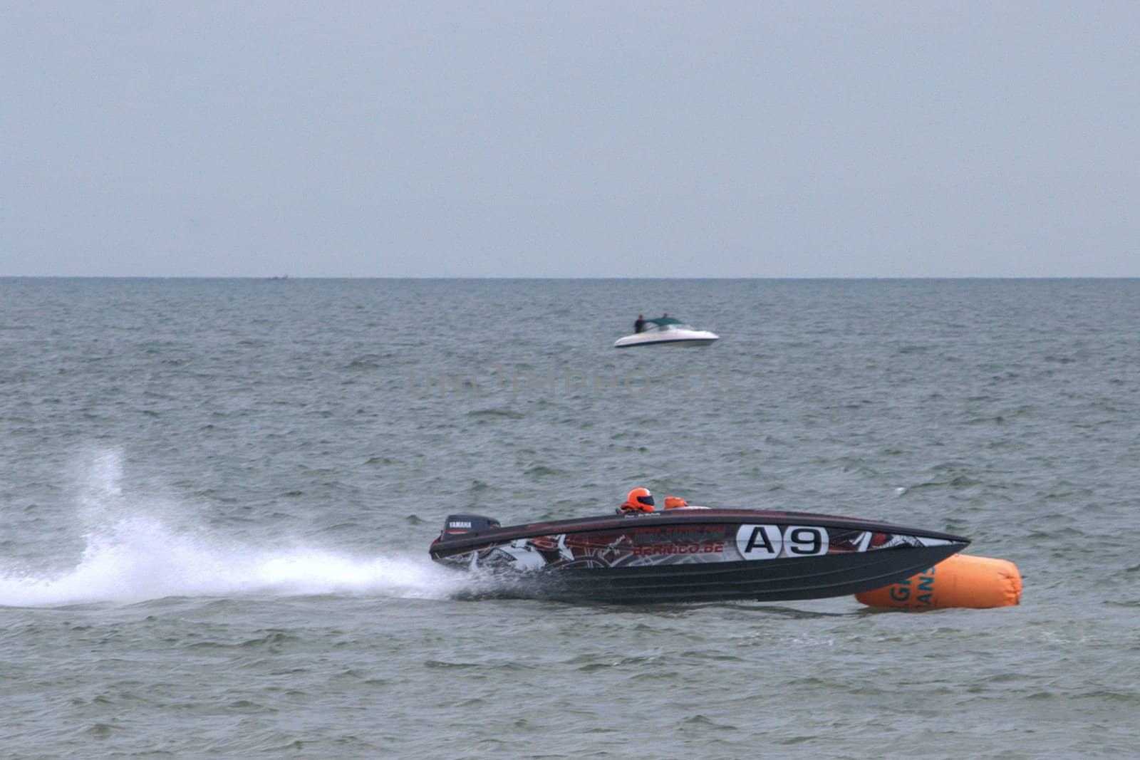Power boat racing to turn