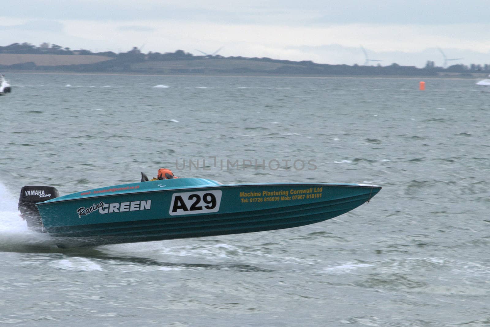 Blue power boat racing