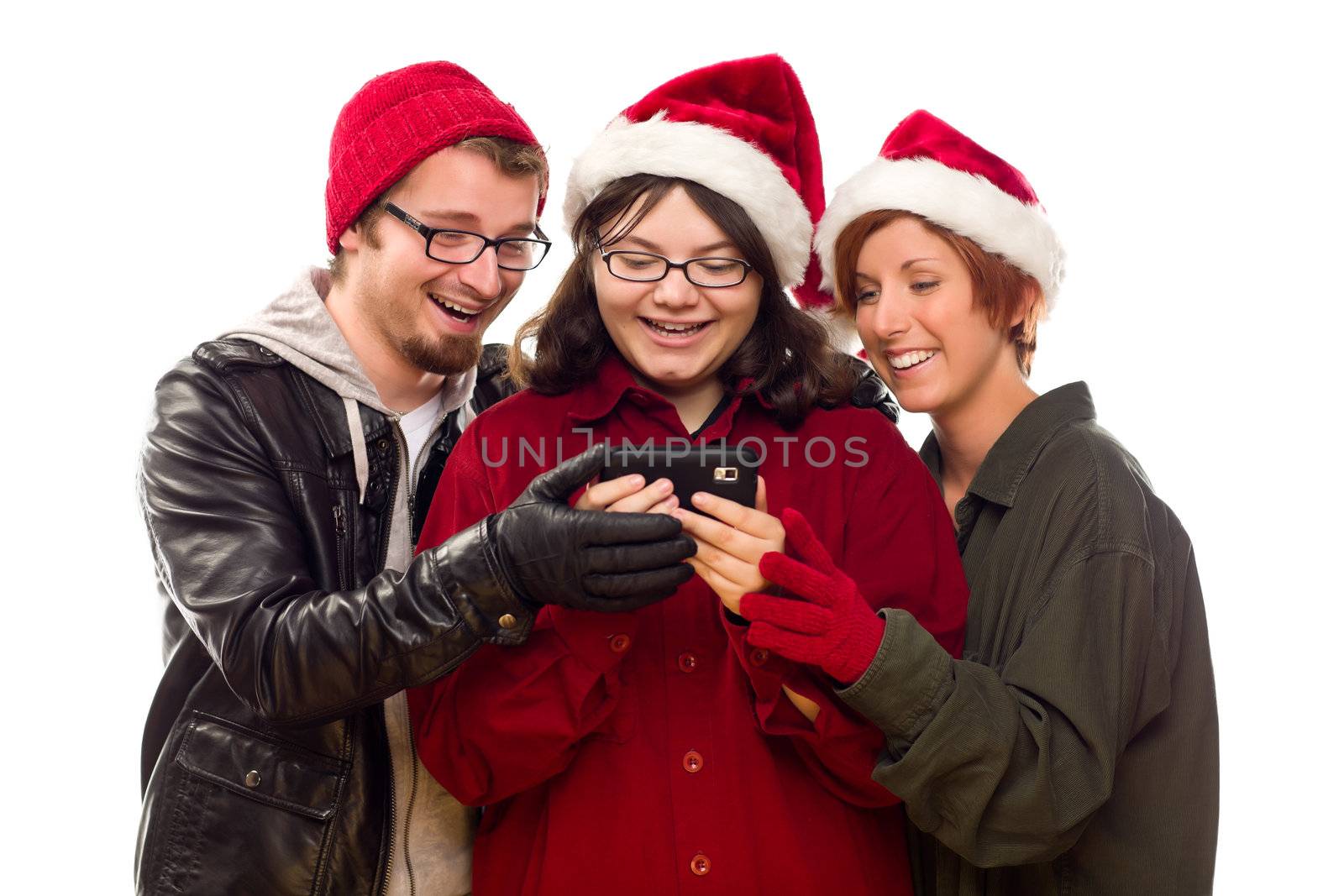 Three Friends Enjoying A Cell Phone Together Isolated on a White Background.