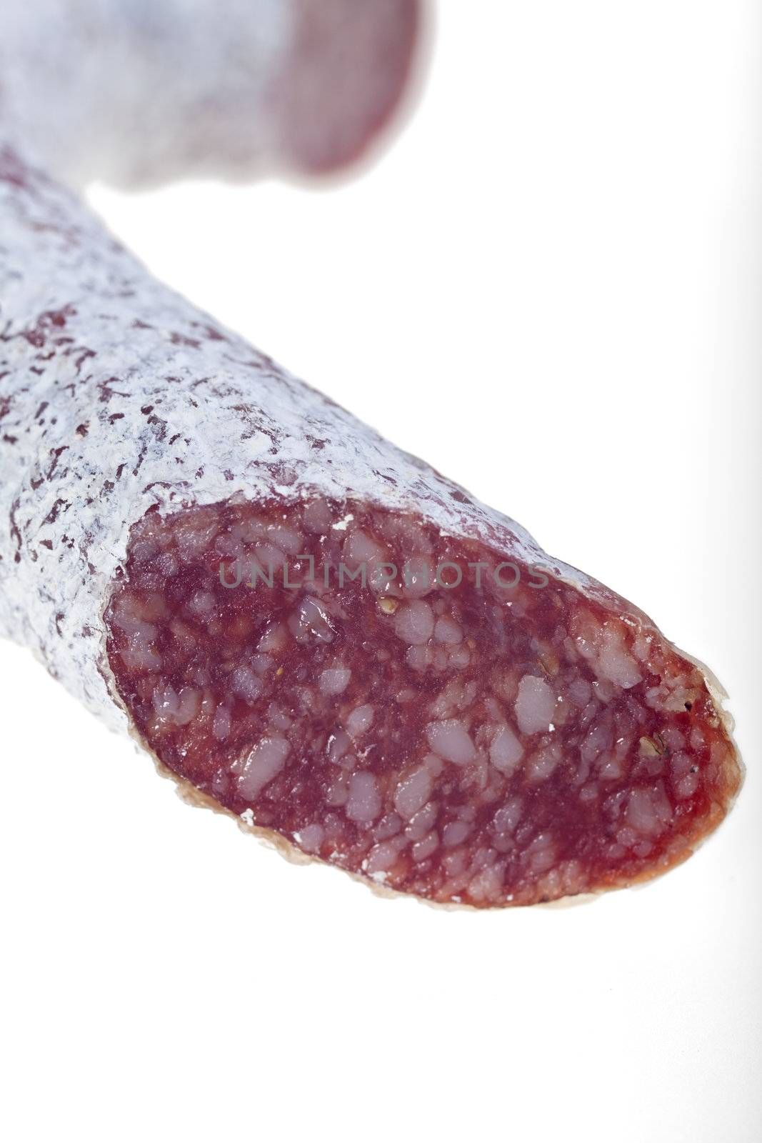 closeup of a salami sausage by bernjuer