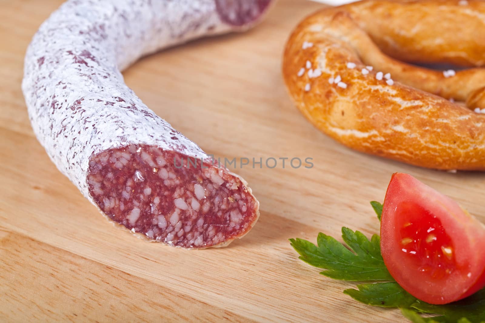 closeup of a salami sausage by bernjuer