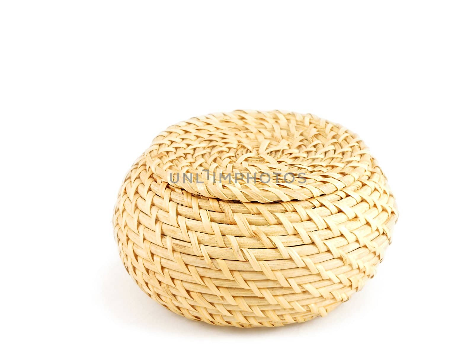 Wooden basket closed with matching top, towards white background