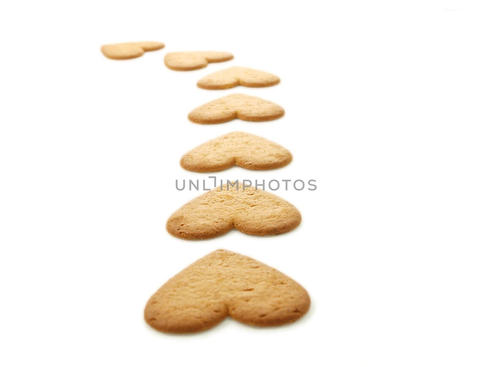Heart shaped gingerbread, white background