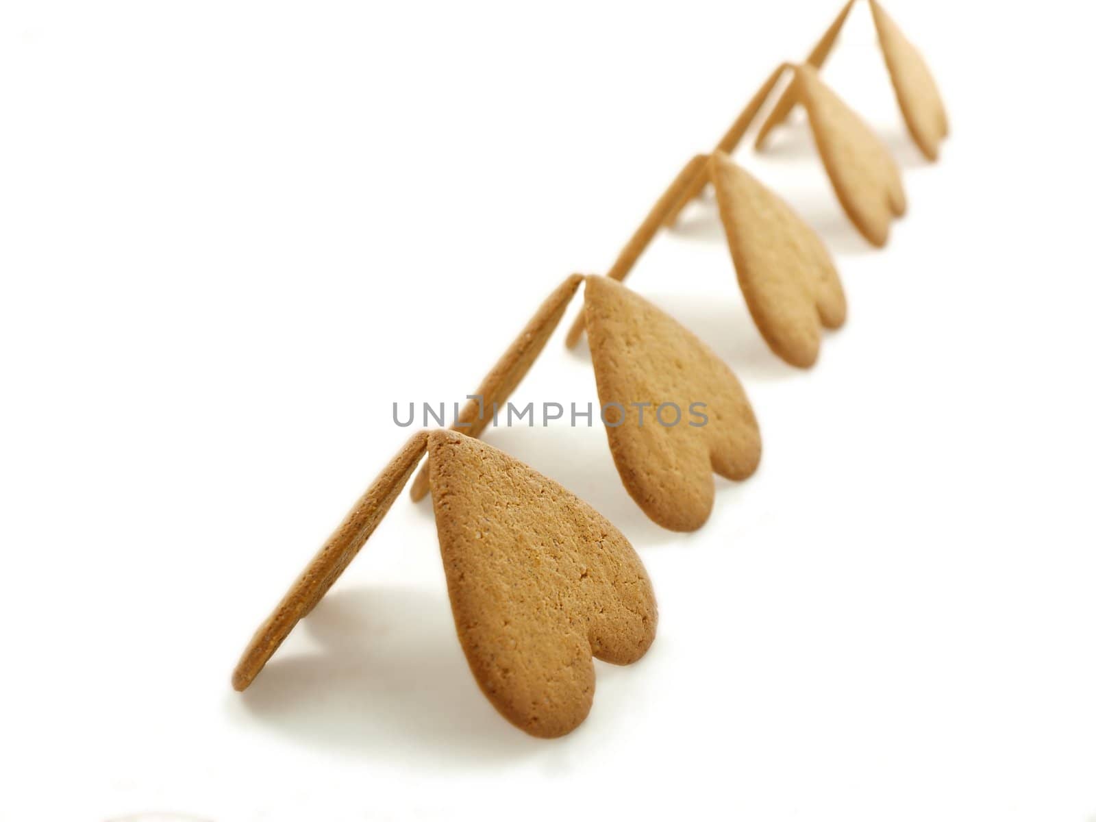 Heart shaped gingerbread, white background