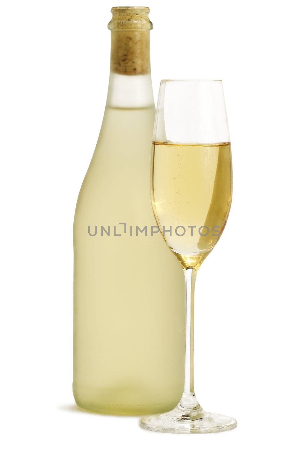 glass of champagne in front of standing dull prosecco bottle on white background