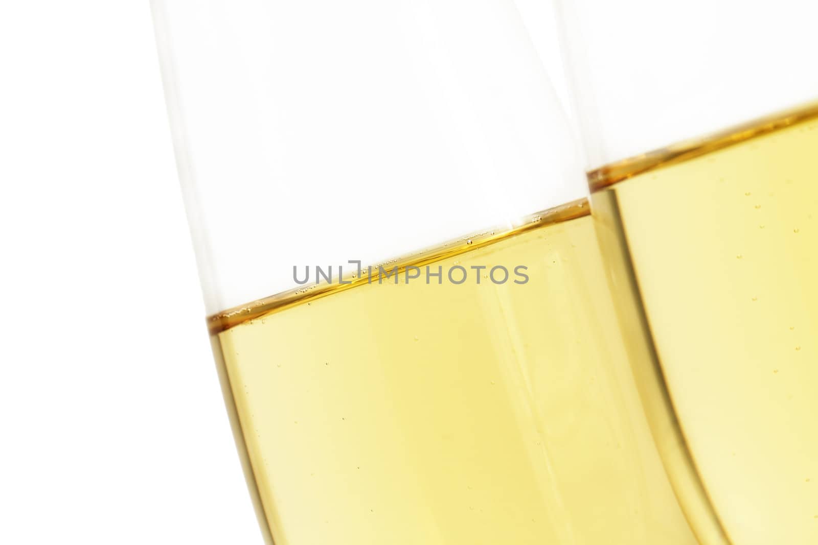 diagonal champagne glass behind other isolated on white background