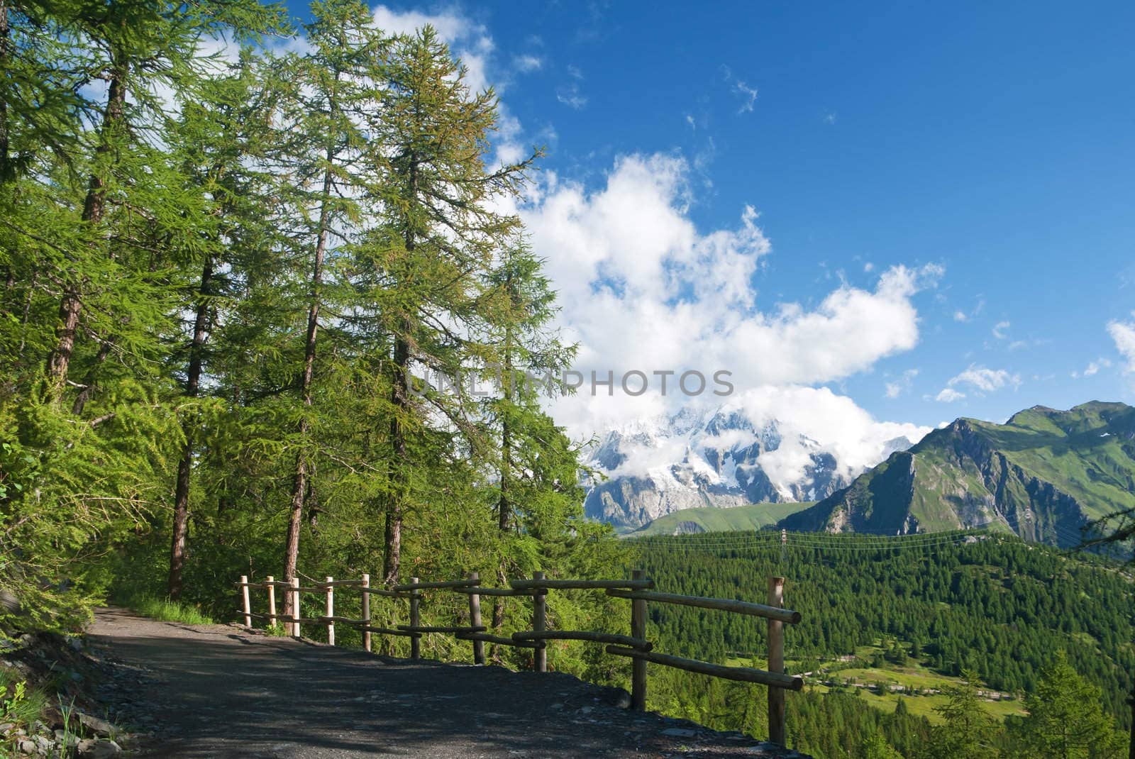 beautiful path in Italian Alps with mont Blanc on background