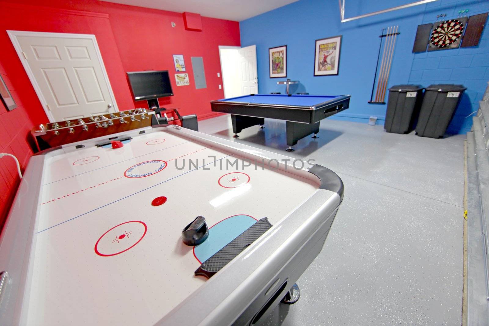 A Games Room with Pool, Air Hockey, Foosball and Dart Board