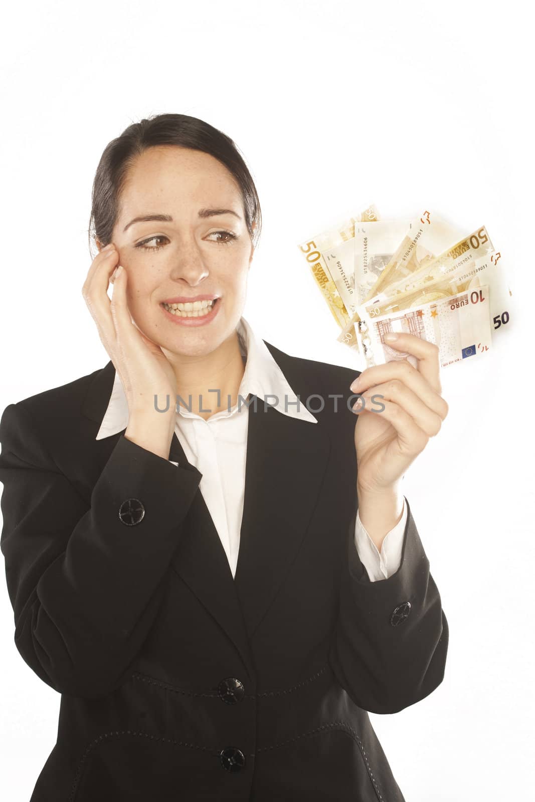 Photo of a depressed young business woman holding currency notes 