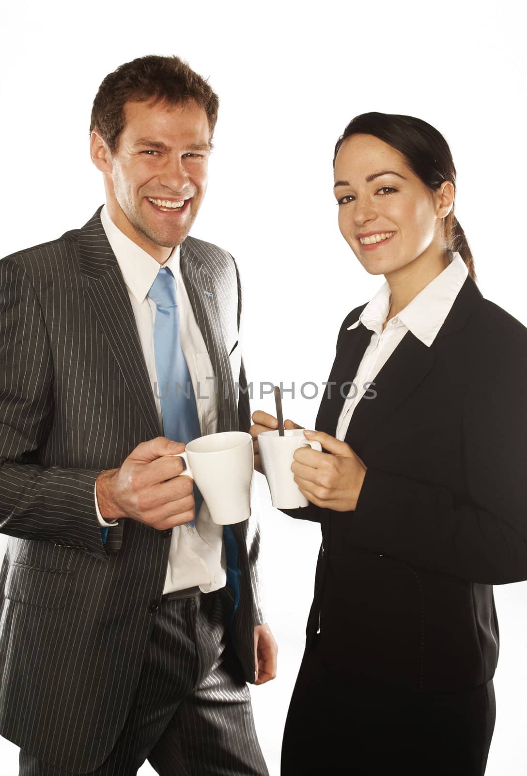 young business couple standing on white background holding a mugs caffe 