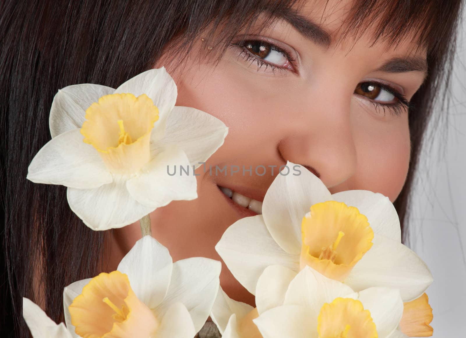 closeup portrait of woman with flowers