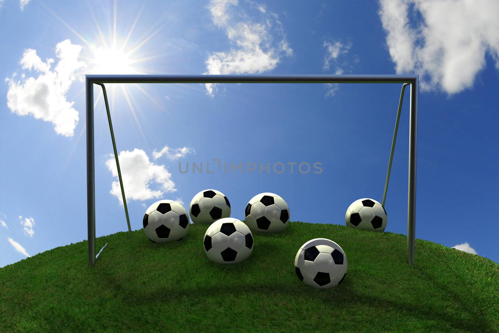 soccer balls and goal on grass hill