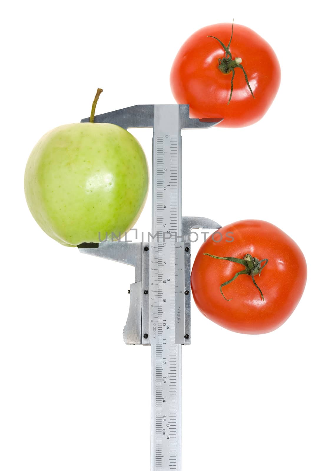 Trimmel with apple and tomato isolated on white. Clipping paths