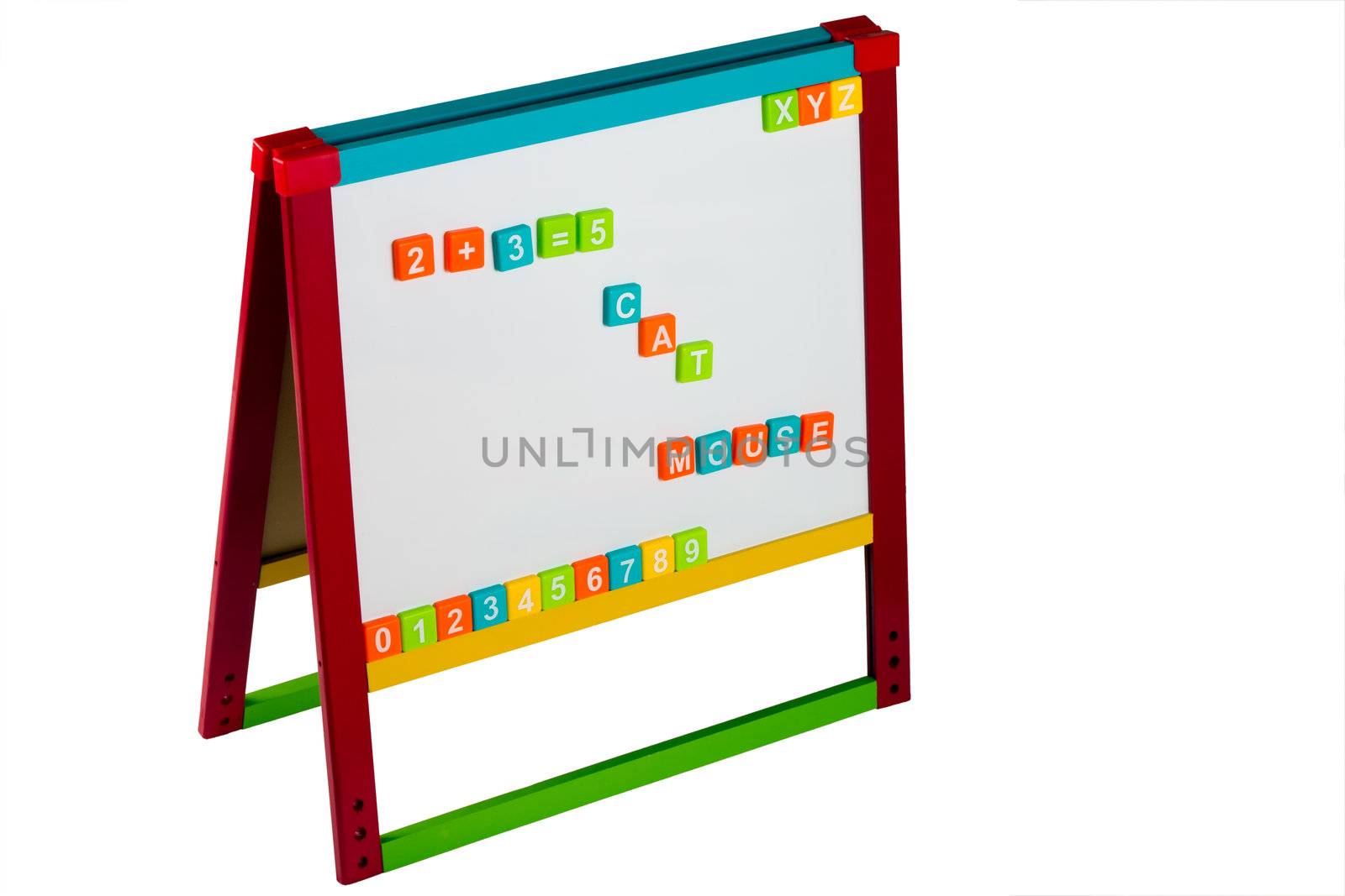 Childs whiteboard with colorful letters and numbers isolated on white
