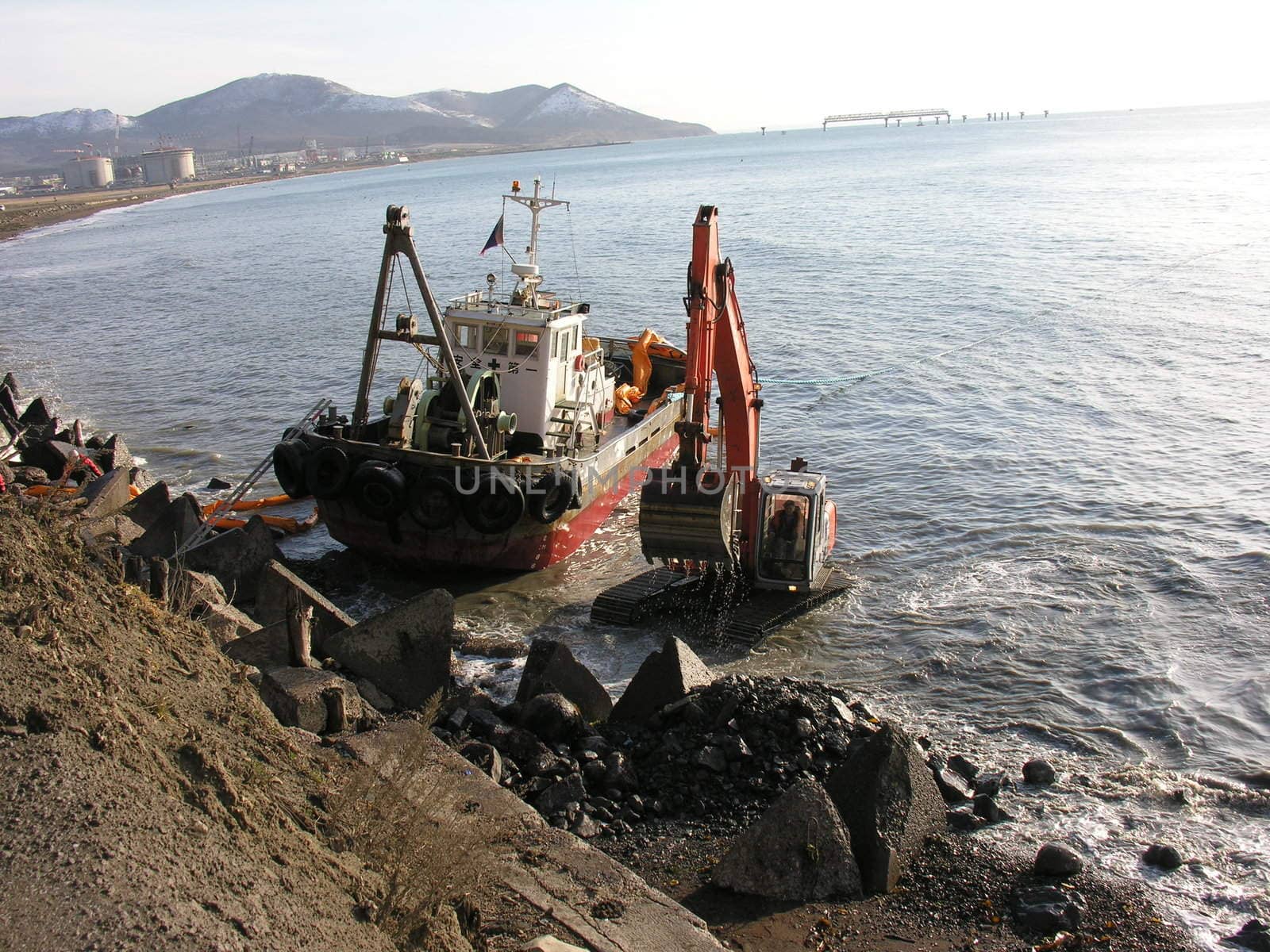 ship and tractor in the sea by Bizon