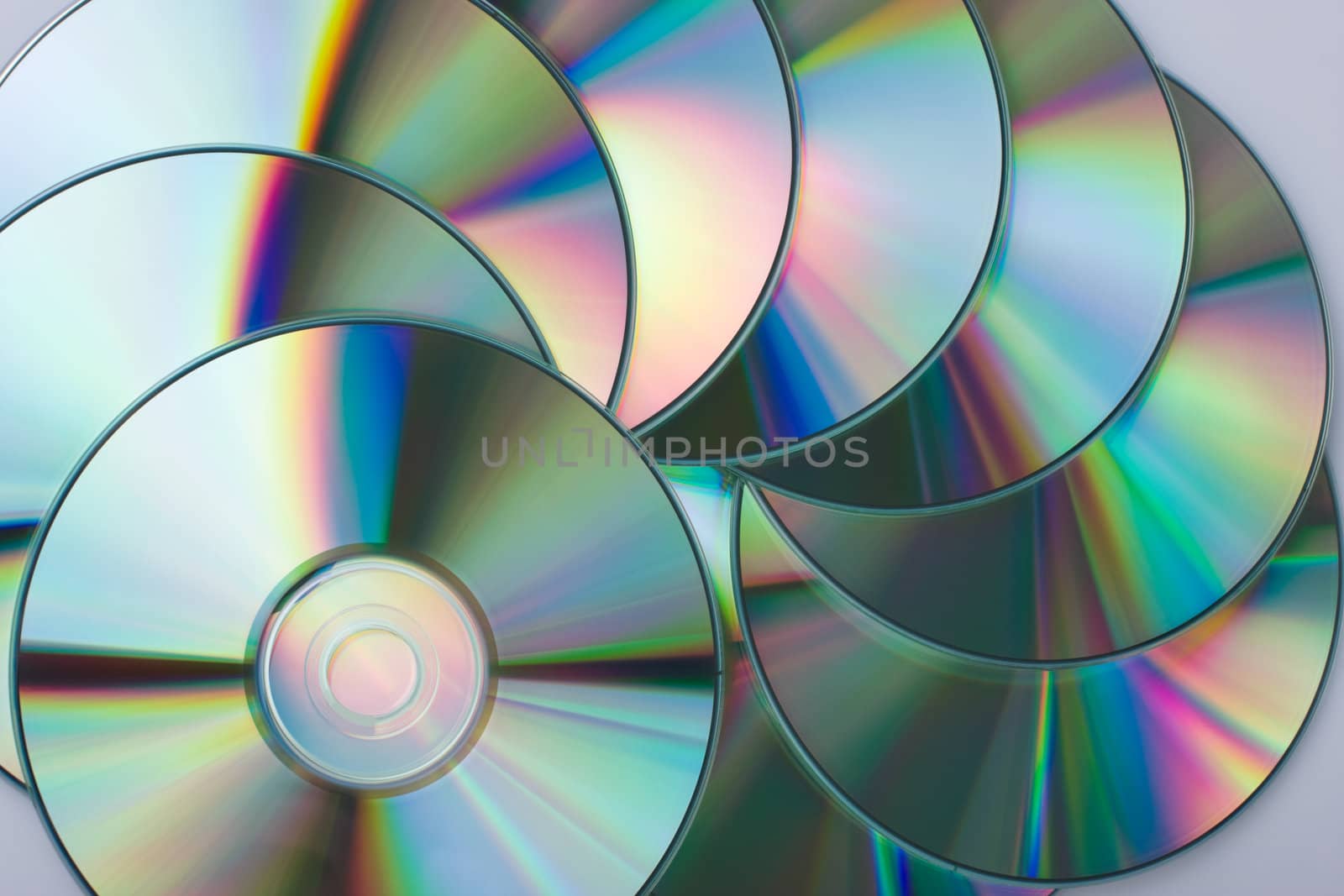 Multicolored CD disks close-up