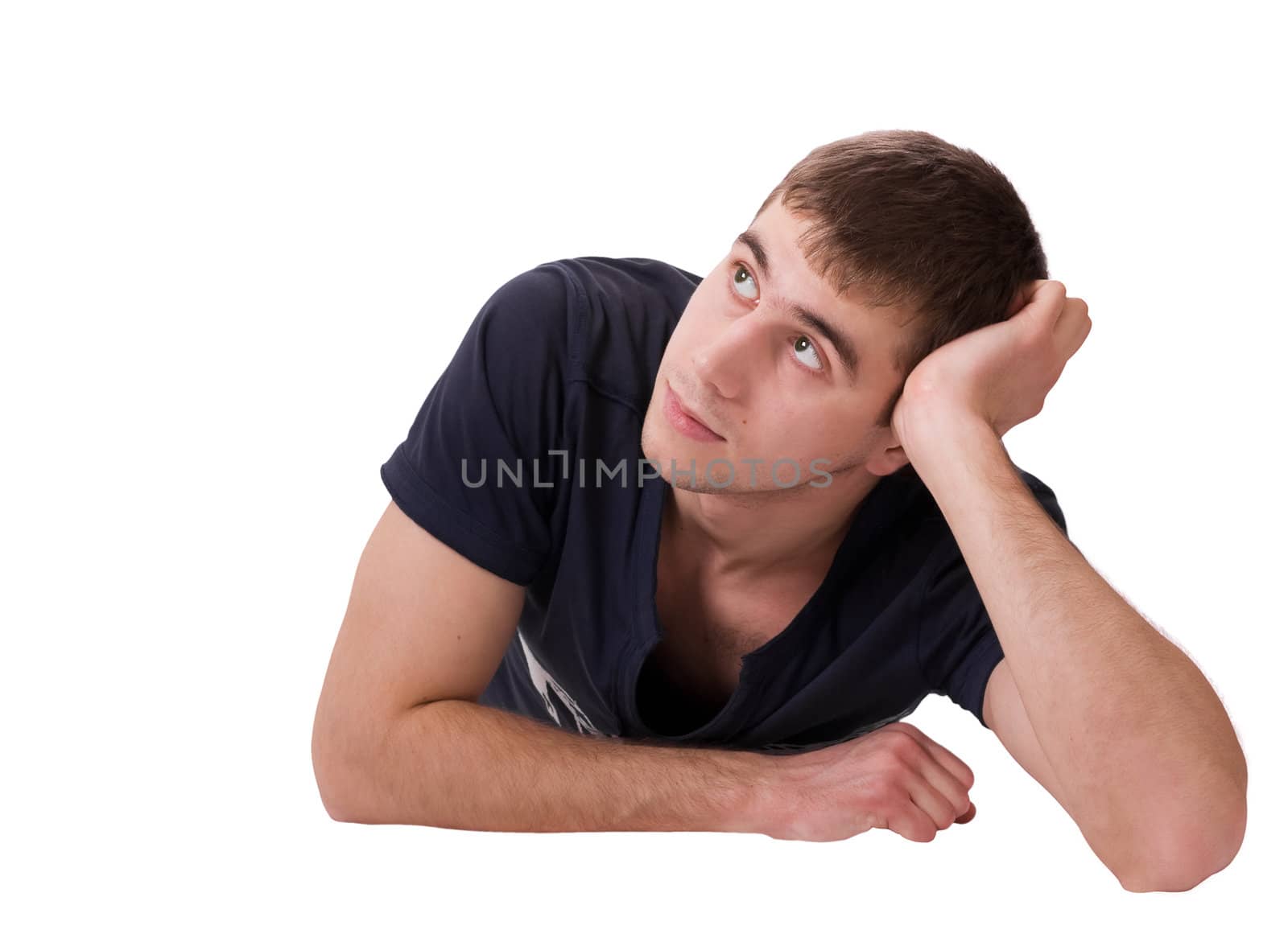 Thoughtful young man lying on isolated white