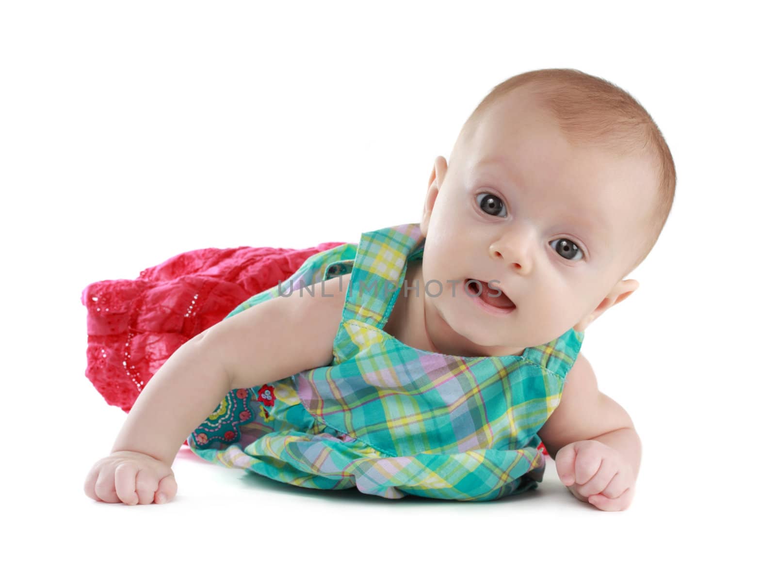 portrait of a cute caucasian baby girl, white background