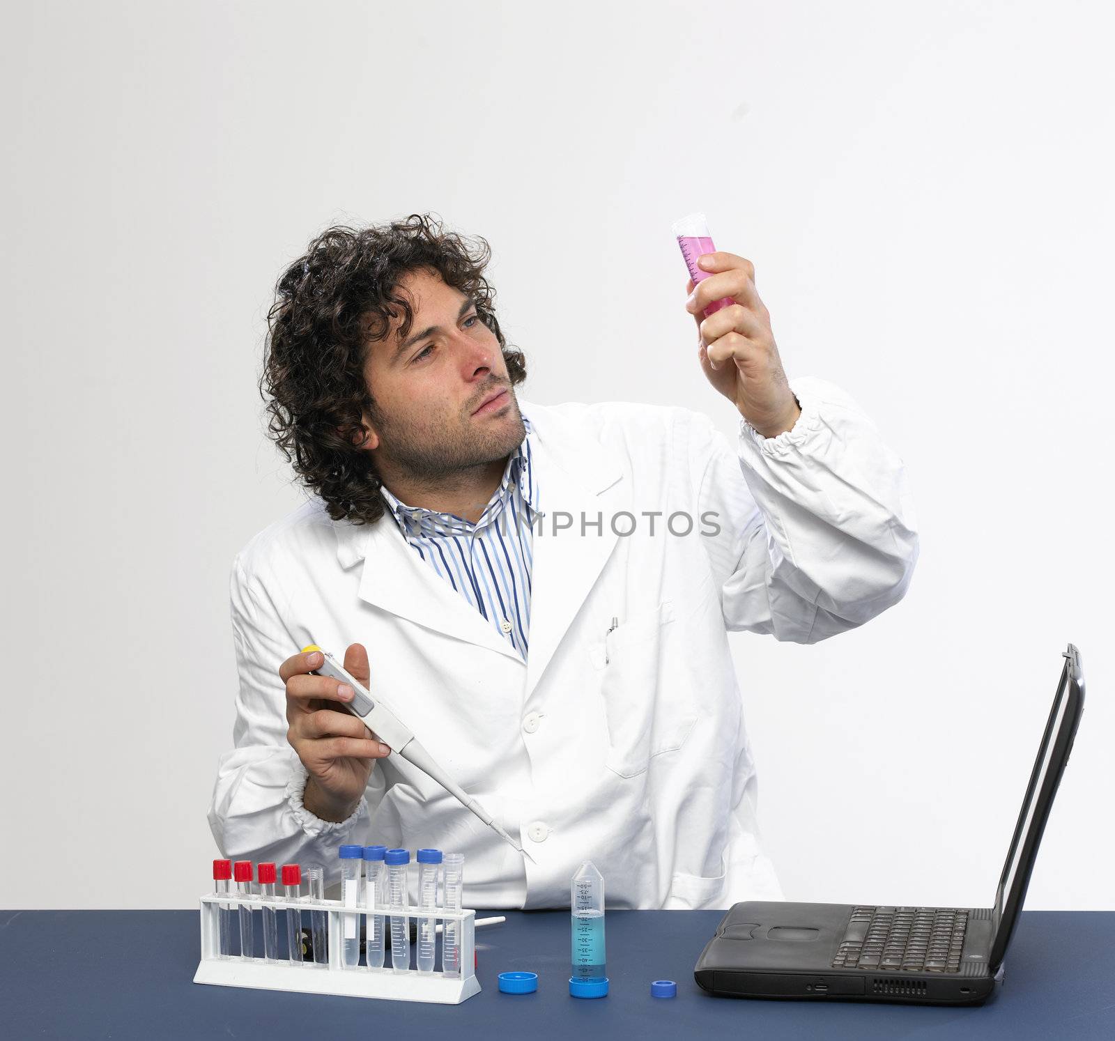 Scientist working in a laboratory isolated on white