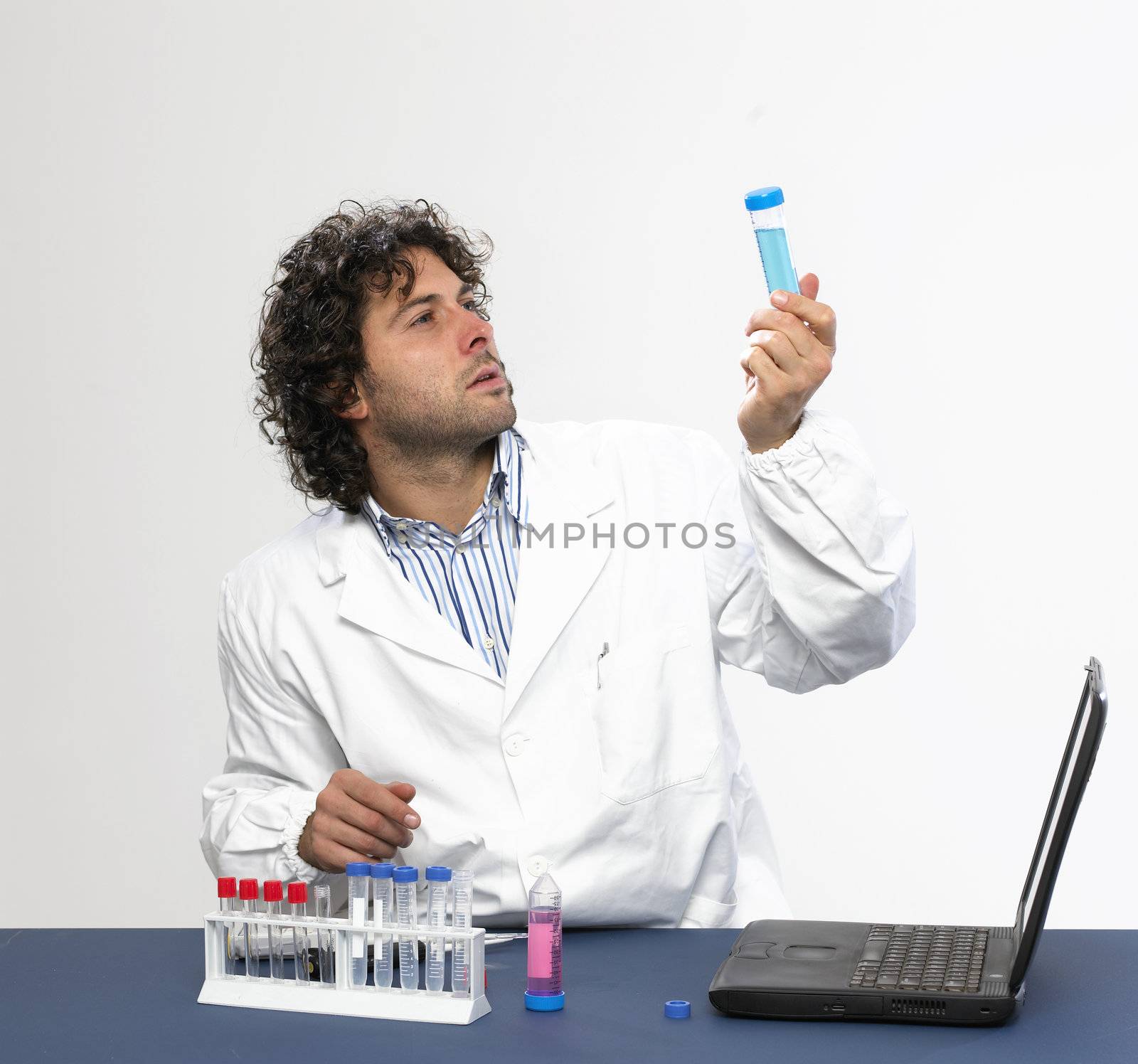 Scientist working in a laboratory isolated on white