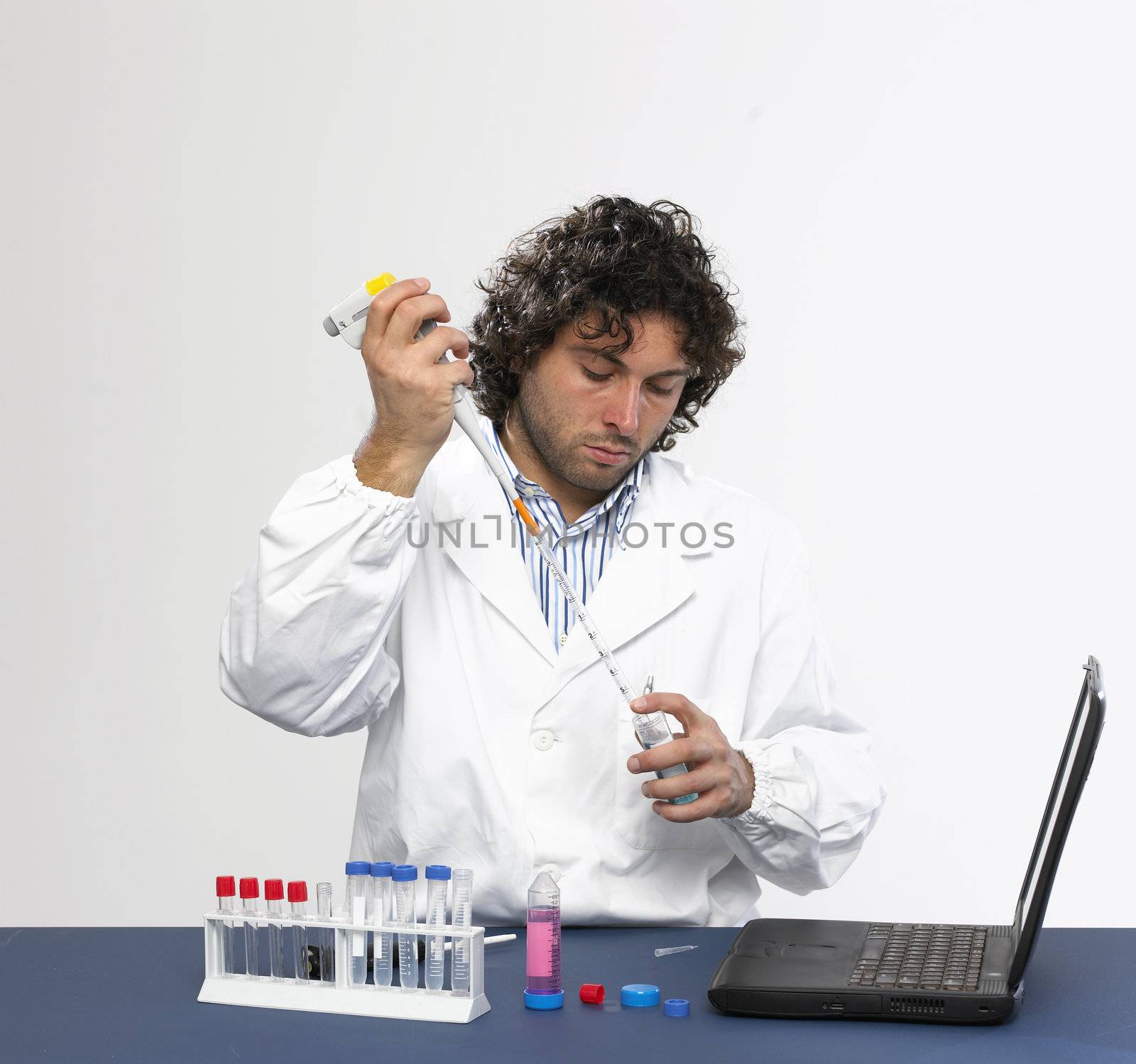 Scientist working in a laboratory isolated on white