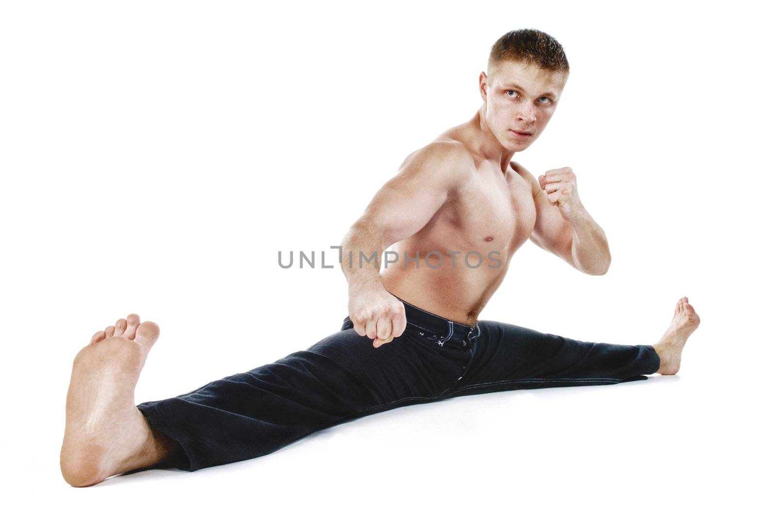 Muscular ultimate fighter-isolated on black background