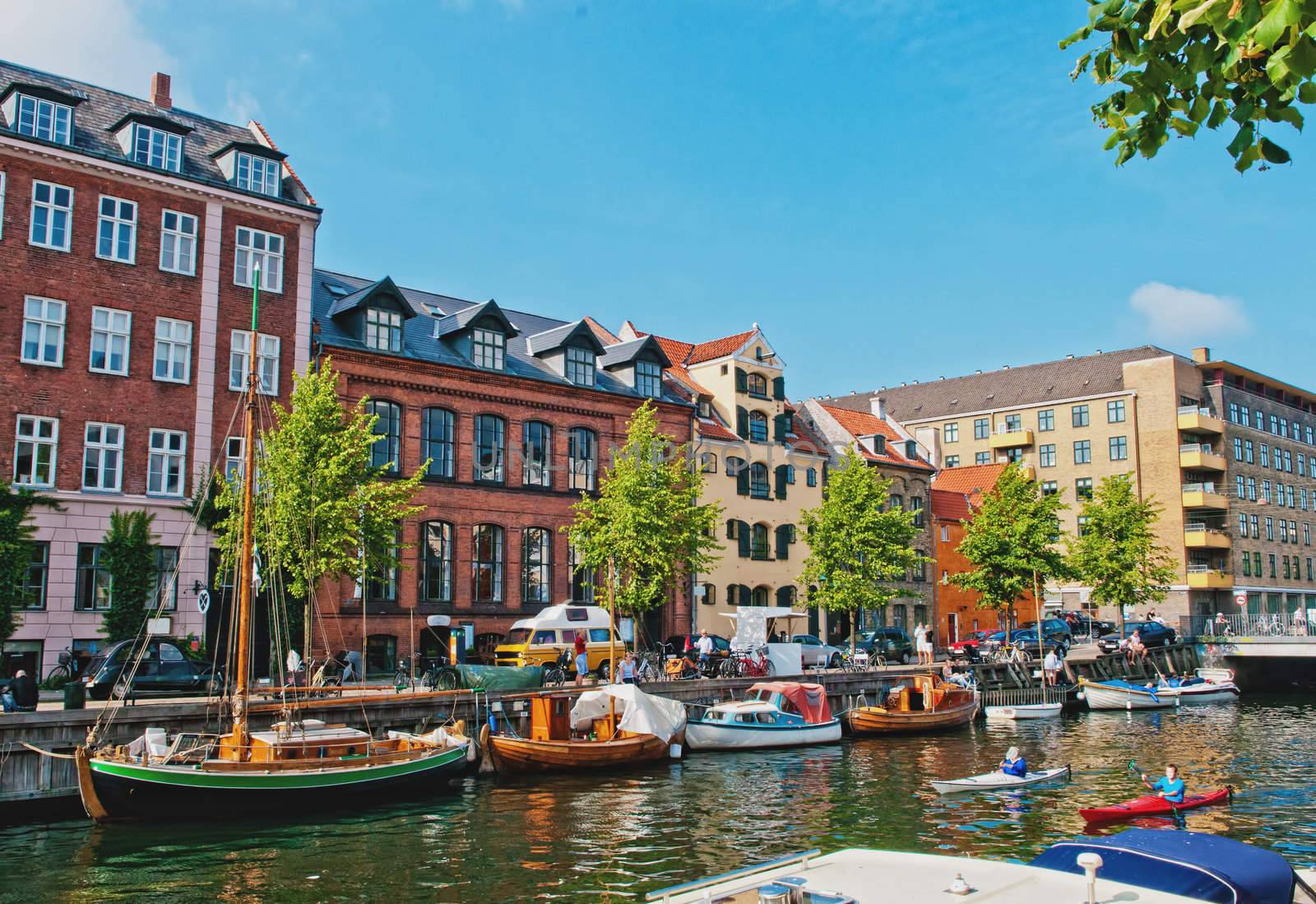 small river flowing through the city center