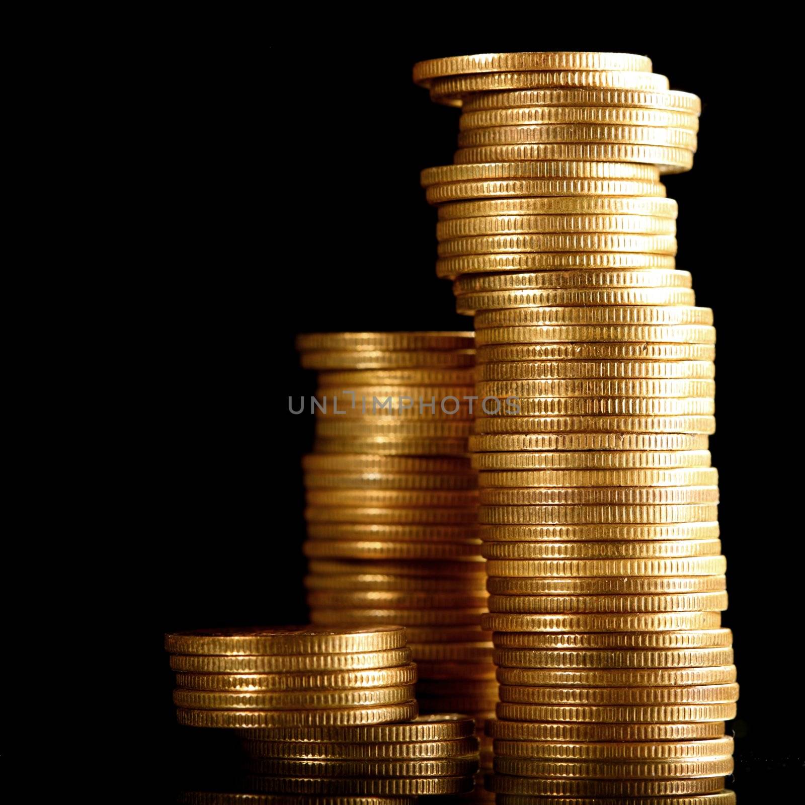 golden coins on black background