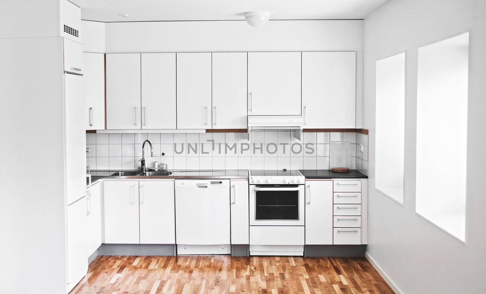 White modern kitchen design is extremely stylish and woodflor