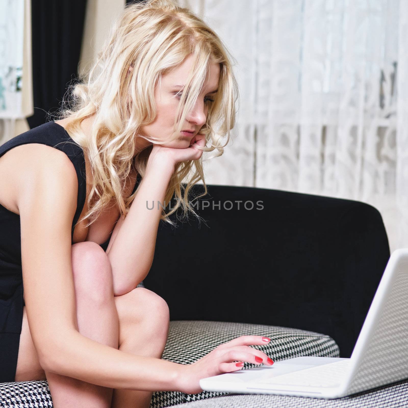 Woman with laptop in room by shivanetua