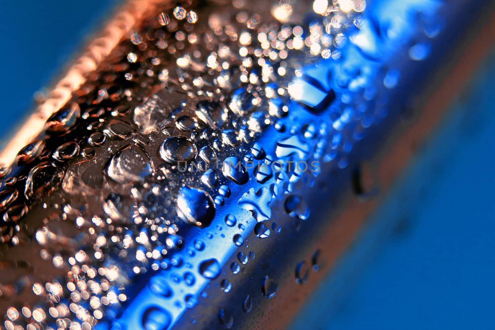 Macro image of a metallic water coated bar