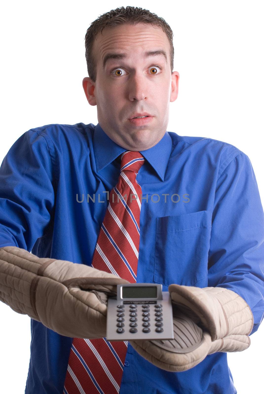 A young banker holding onto his calculator with oven mitts, isolated against a white background