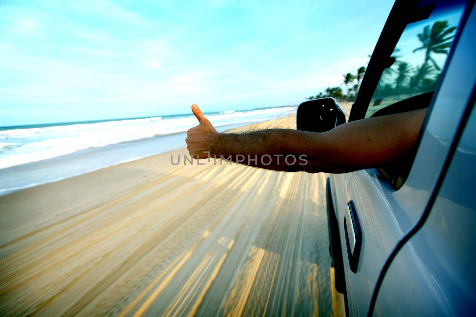 beach drive car thumbs up by Yellowj