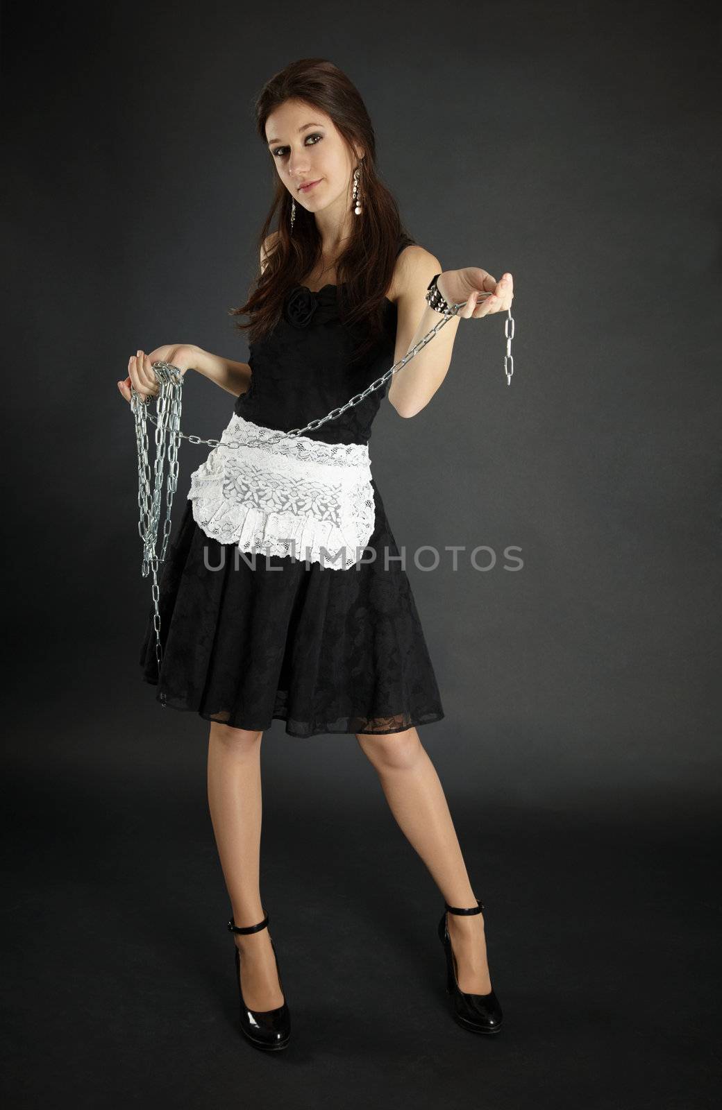 Woman in maid costume with chain by pzaxe