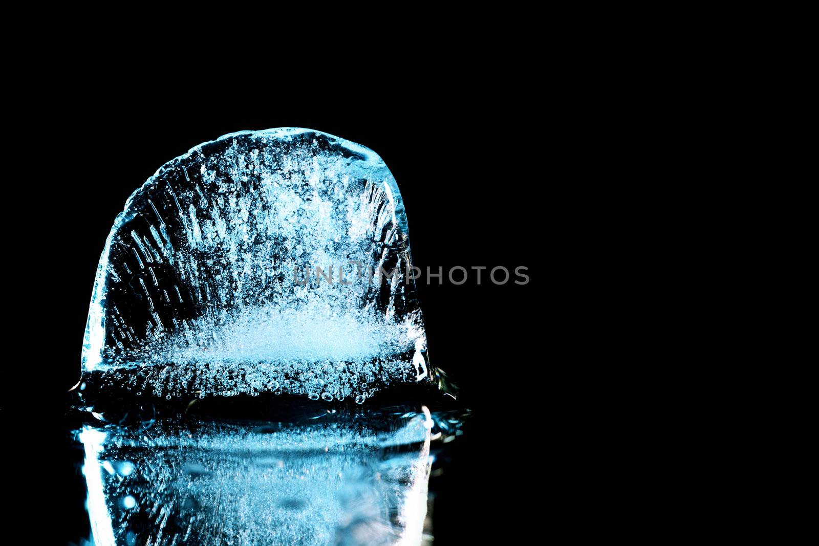 ice on black background close up