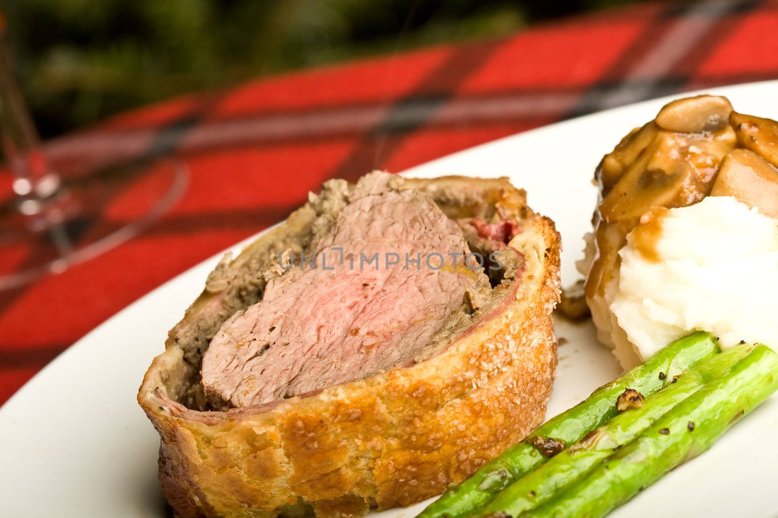 beef wellington tenderloin wrapped in ham mushrooms and puffy pastry