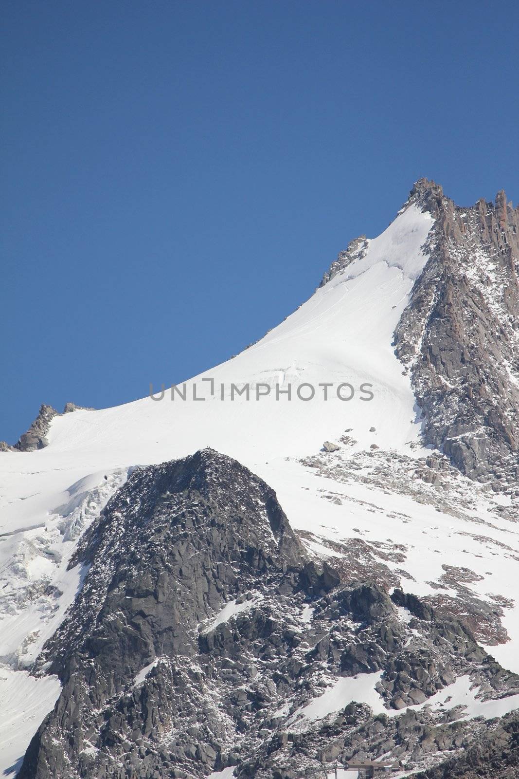 mountain and snow white and sky bluea