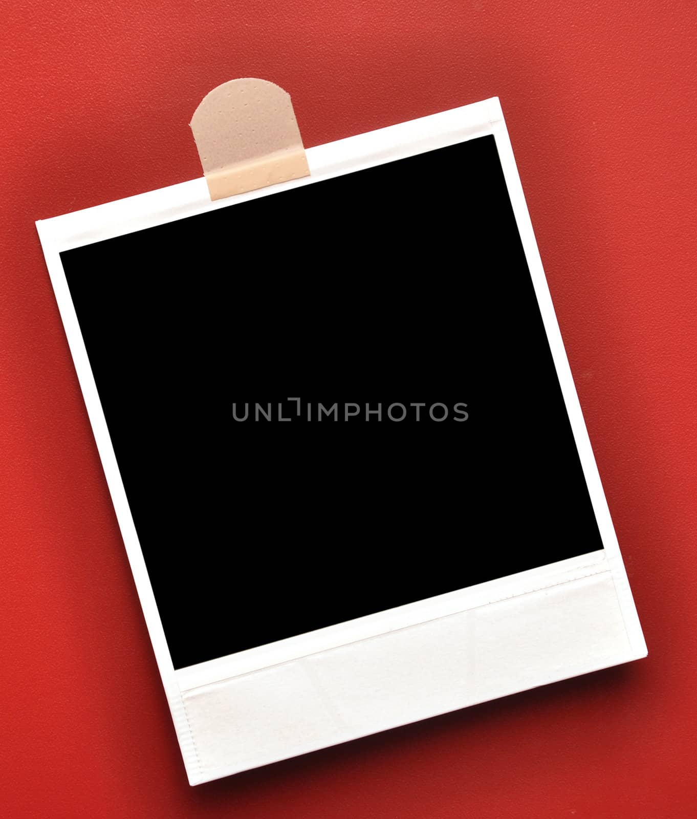 photo frame pressed to the red background
