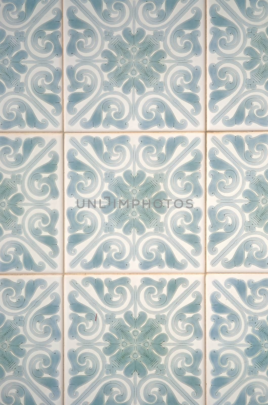 Traditional Portuguese azulejos - painted ceramic tilework.
