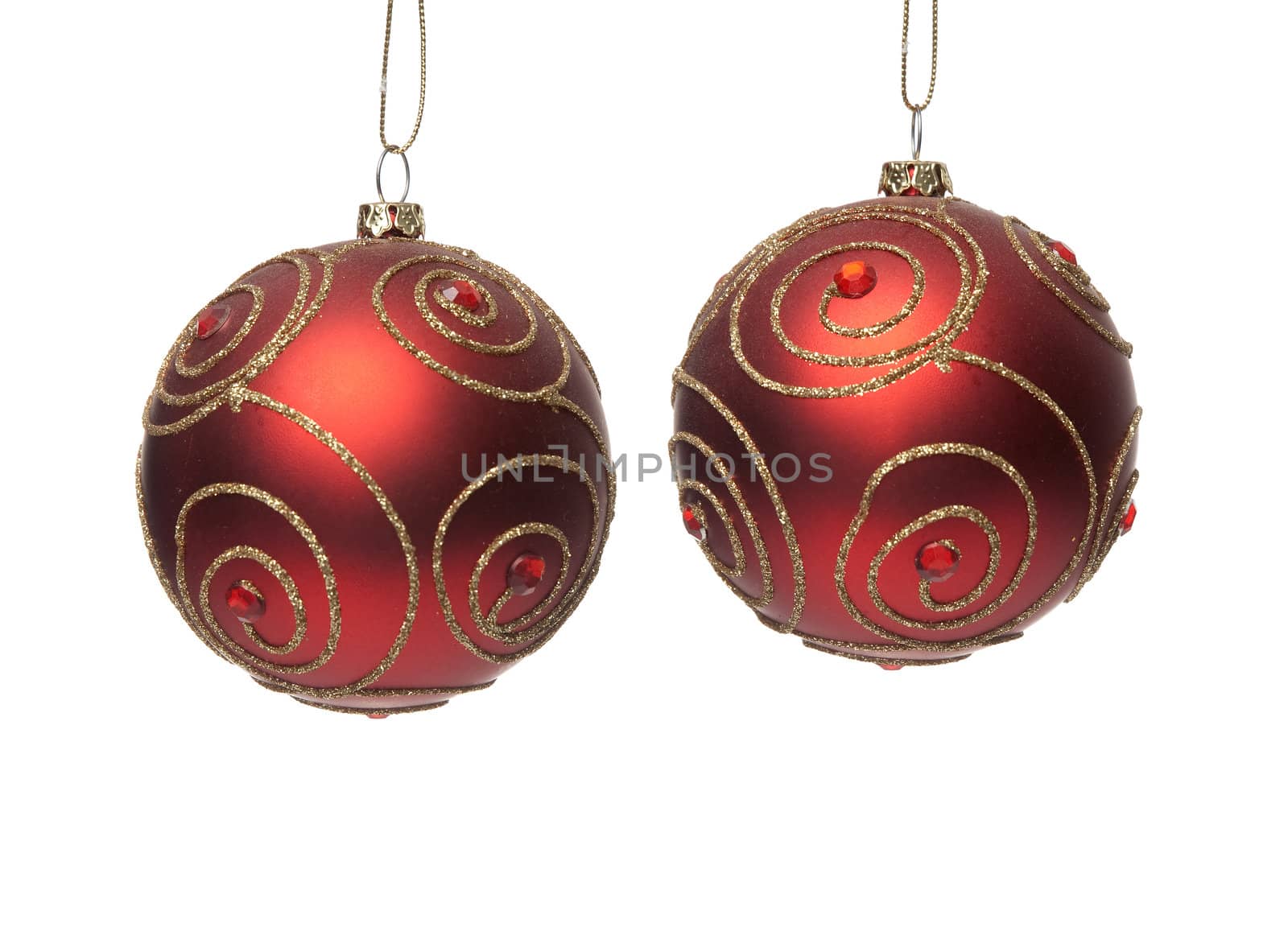 Two red Christmas balls isolated on white background.