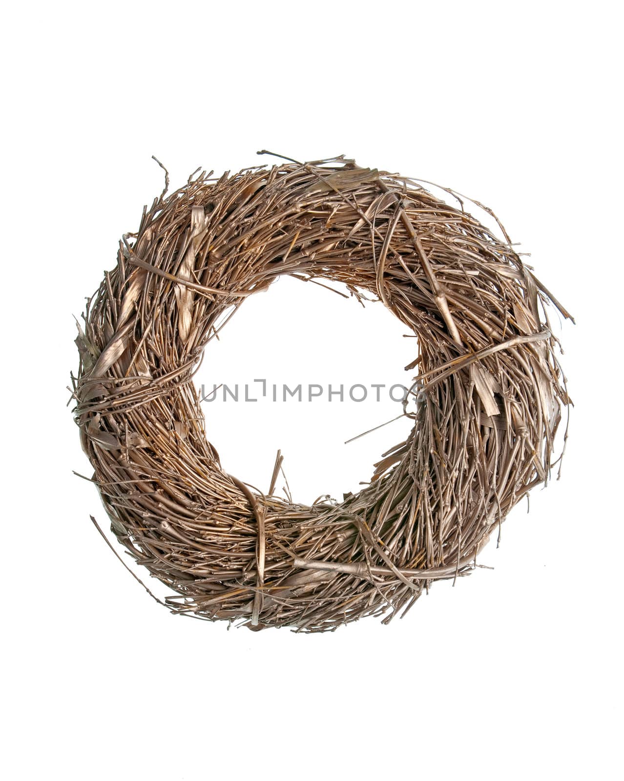Wreath made with straw isolated on white background.