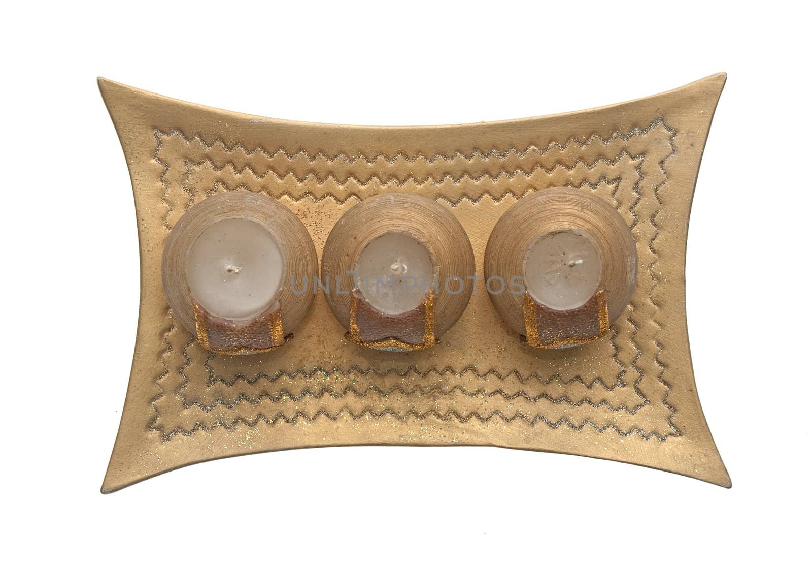 Christmas decoration with golden wax candles on a white background.
