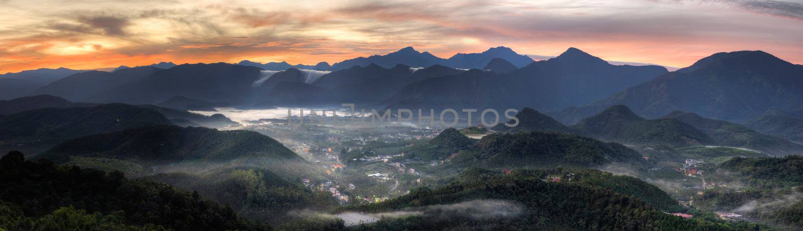 Panoramic rural scenery sunrise with samll town in hill and forest, Taiwan, Asia.