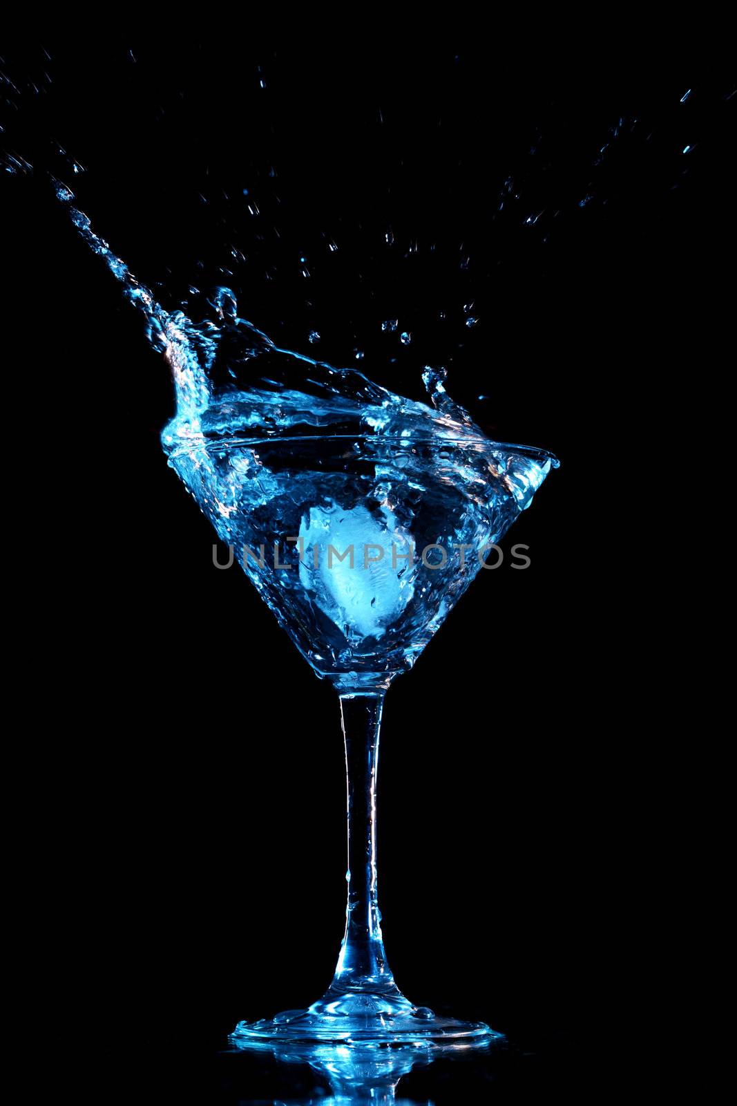 alcohol splash on black background