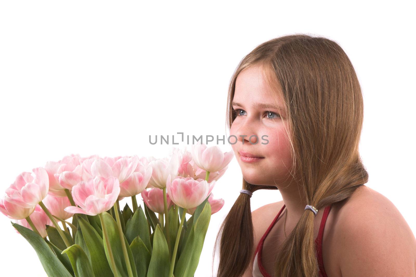 Pretty girl with pink tulips