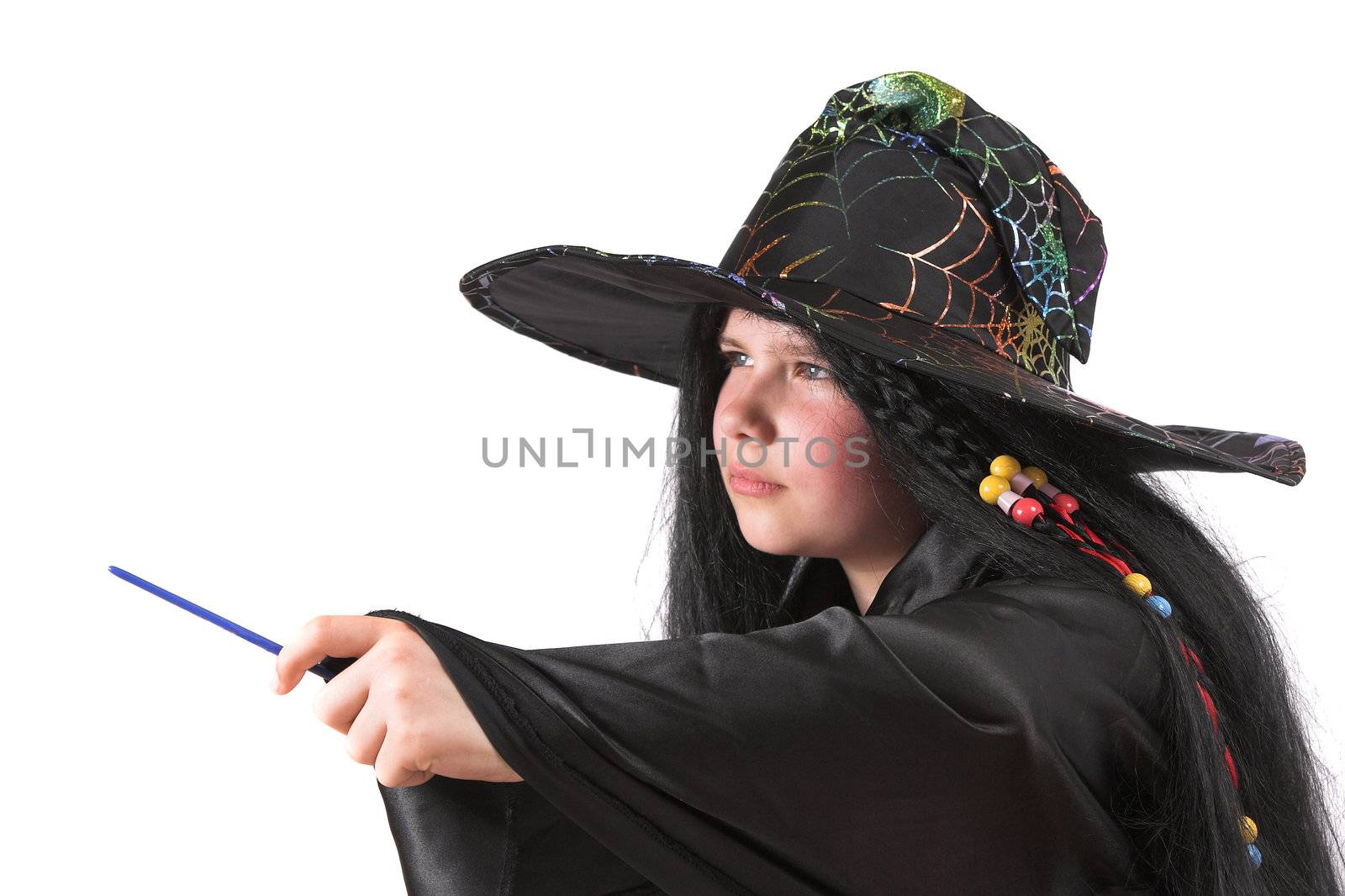 Little girl playing witch during Hallowee