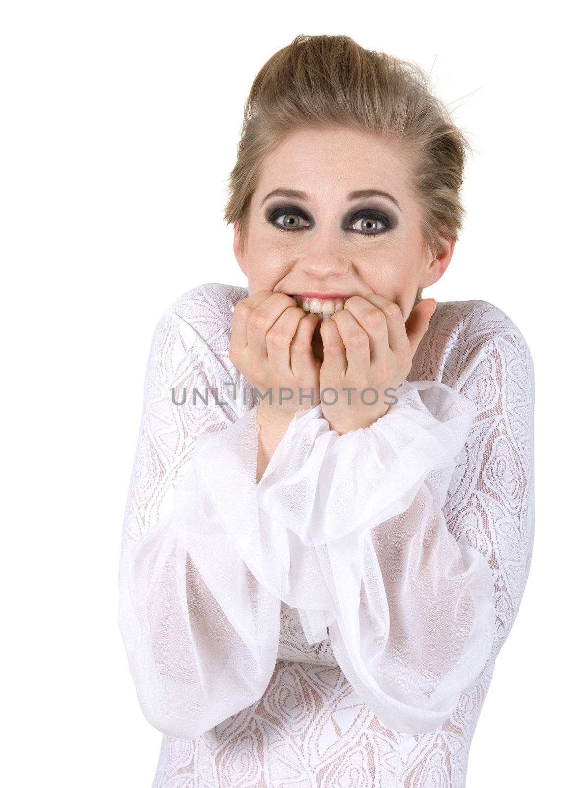Girl in white dress showing guilty emotion