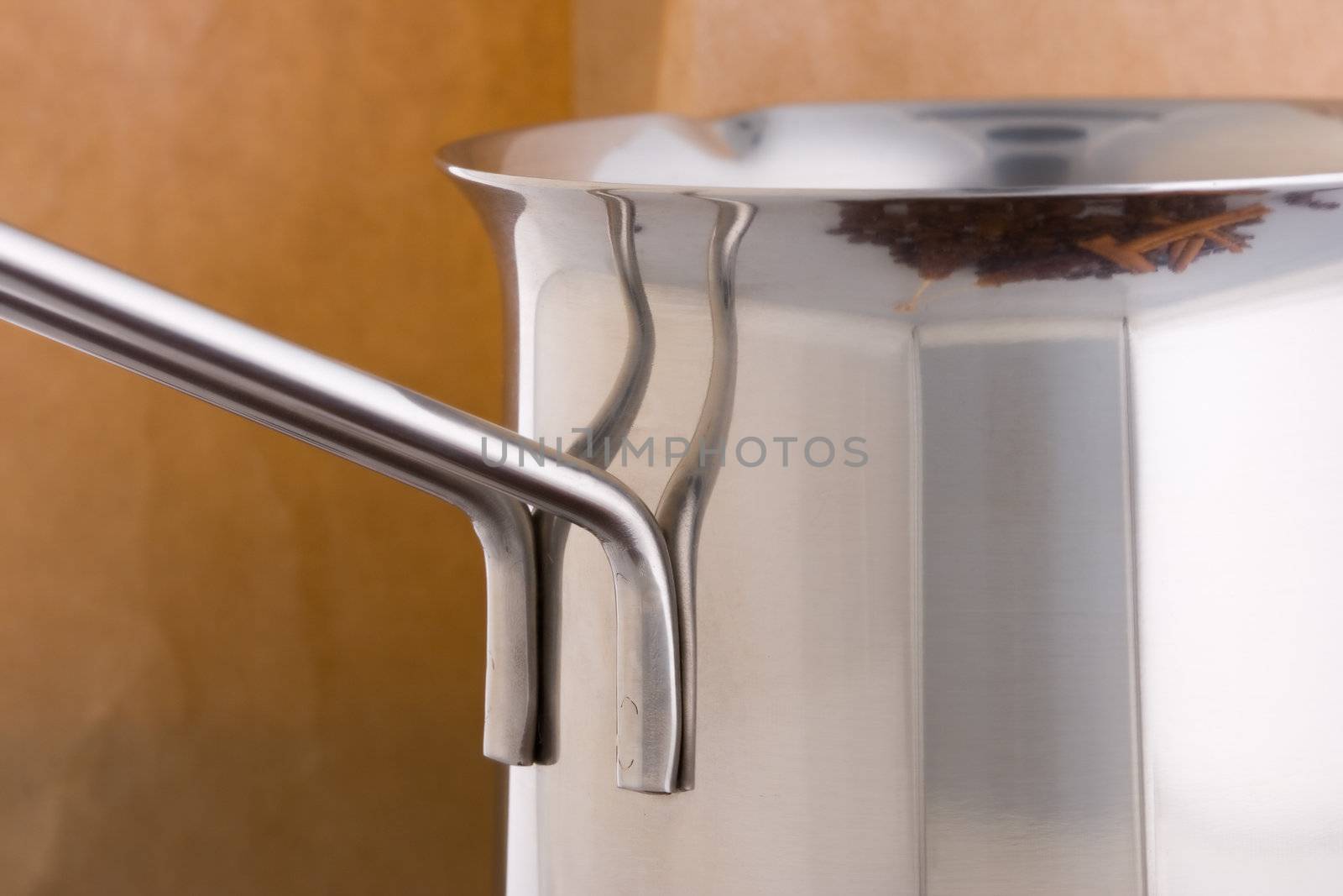 Close-up of coffee pot with shiny handle
