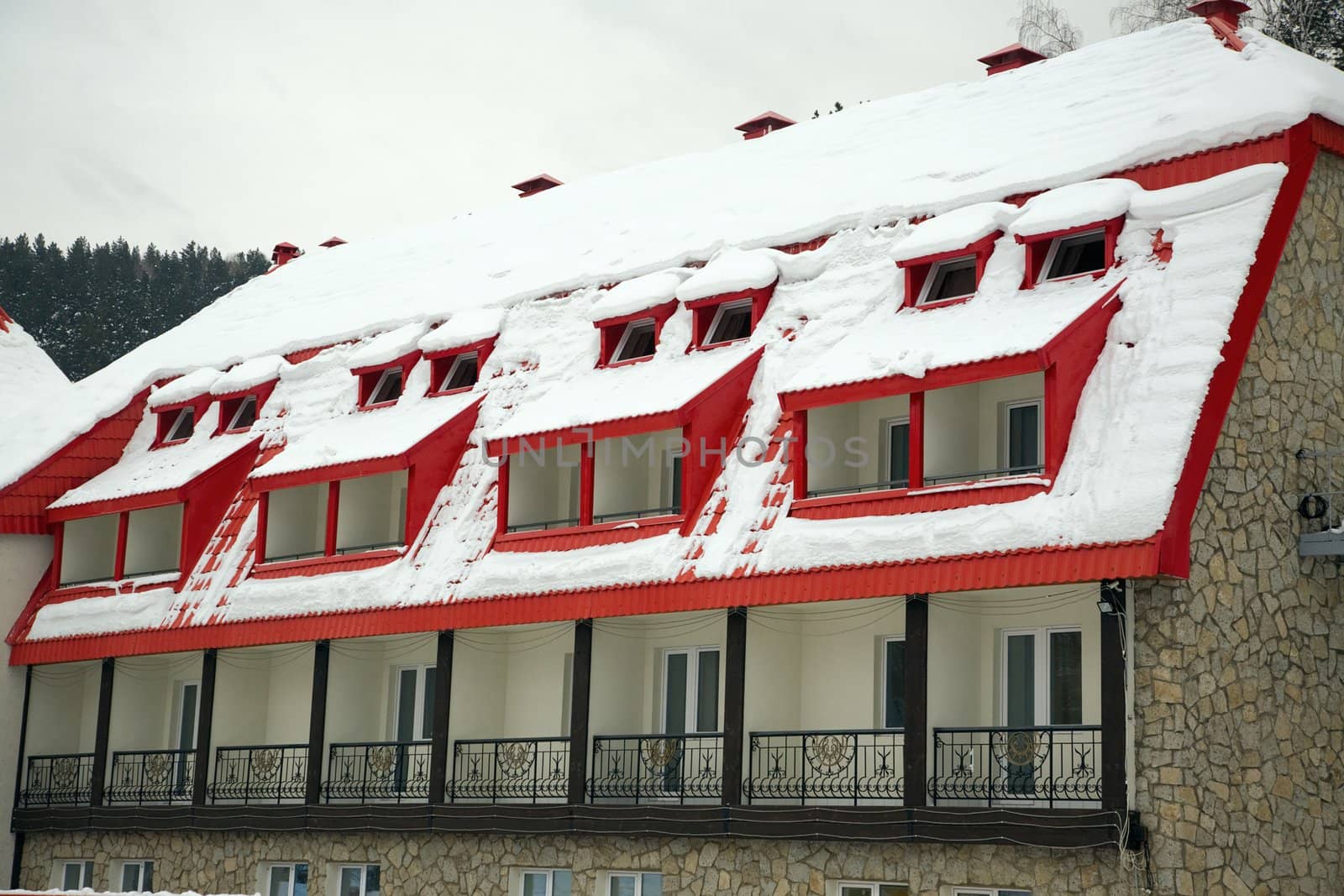 Snow-covered roof of alpine hotel, Belokurikha resort, February 2008