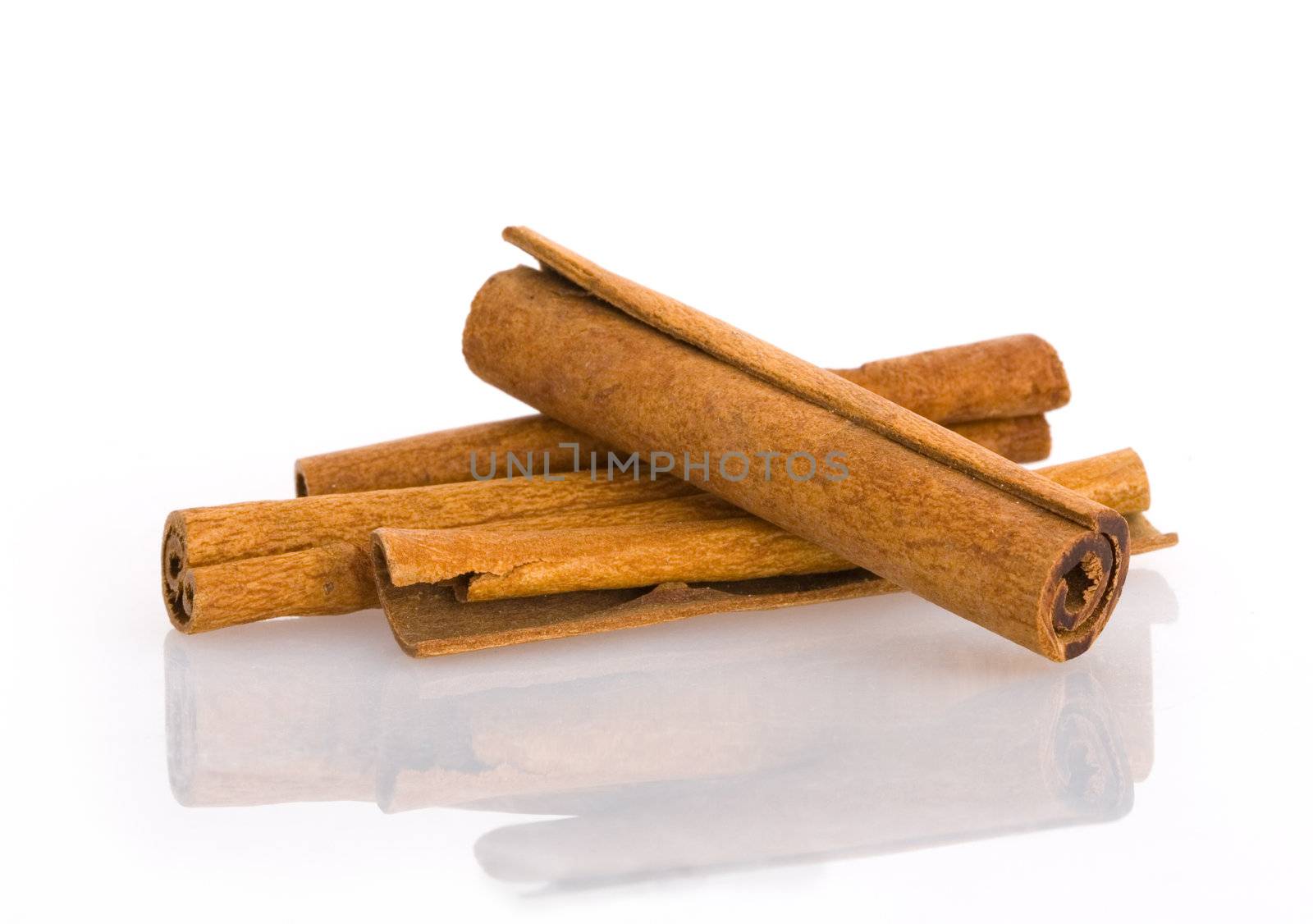 Fresh cinnamom sticks on isolated white background 